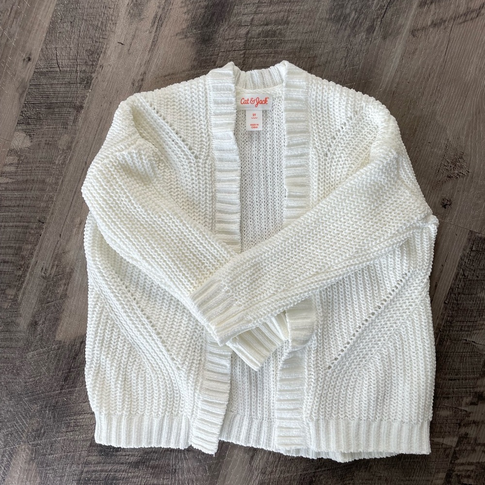 White cardigan sweater